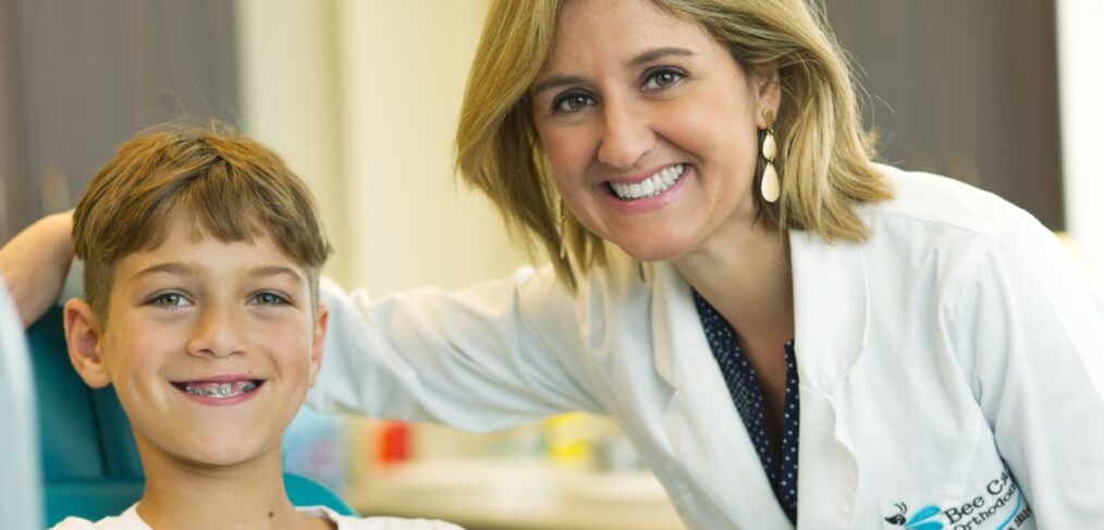 Dr. Adriana with a young patient at Bee Cave Ortho